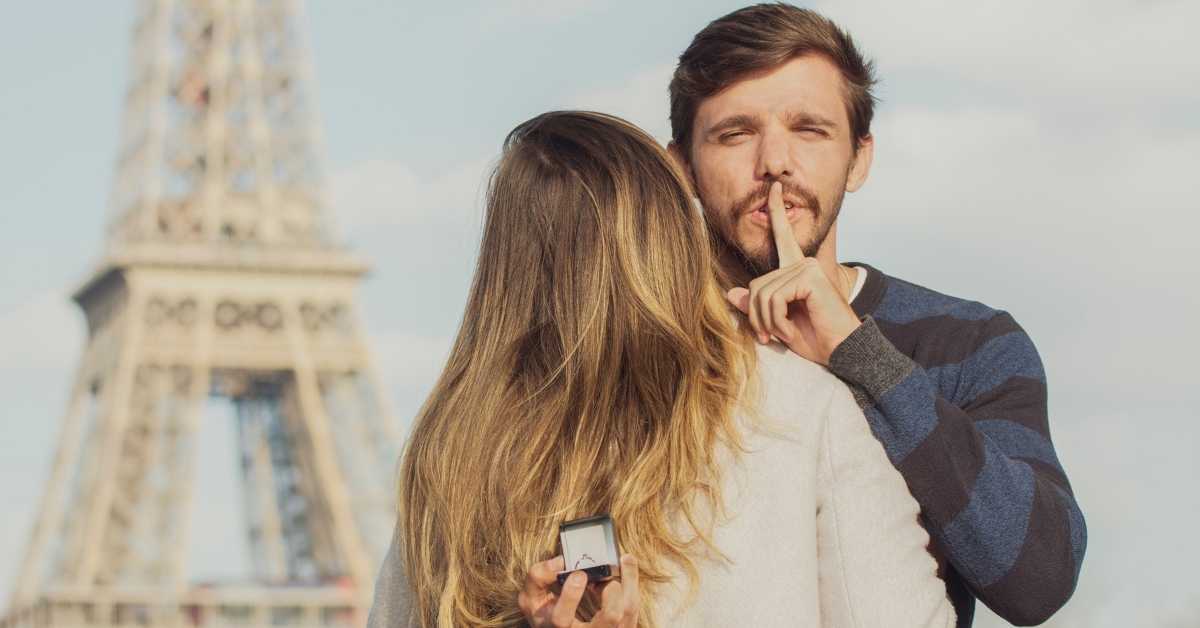 man hiding an engagement ring