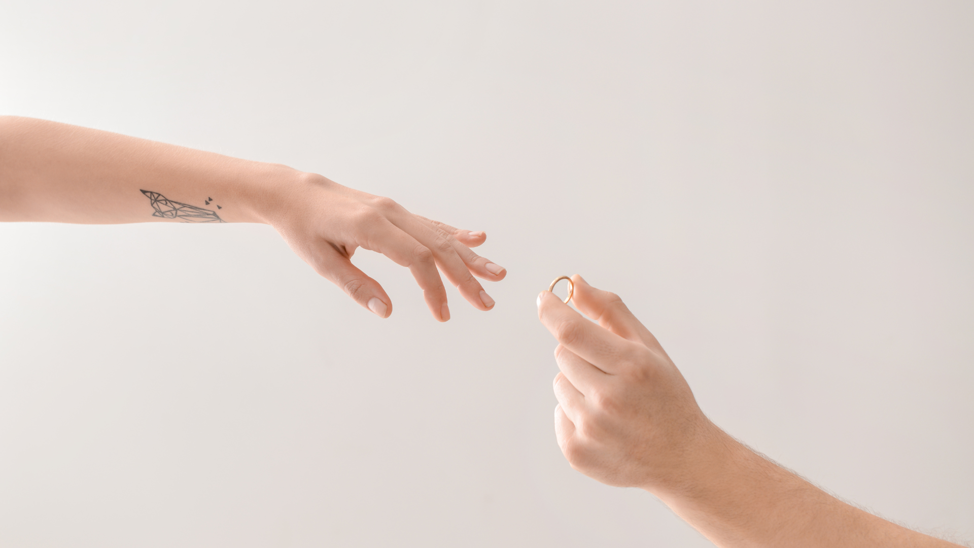 man hiding an engagement ring