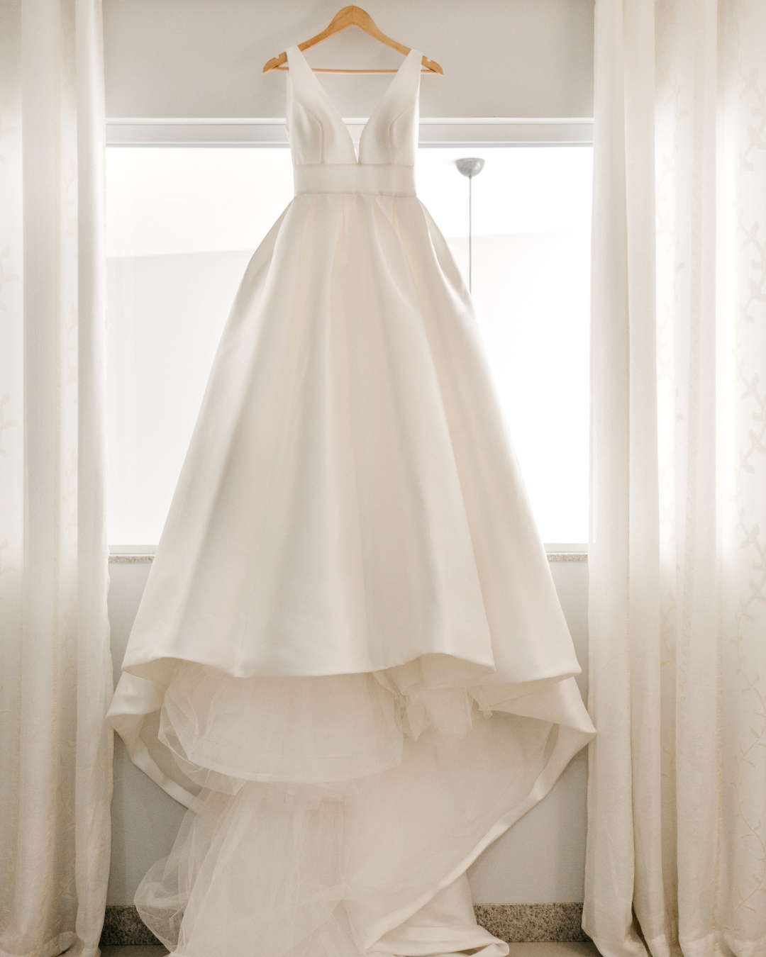 clean wedding dress hanging