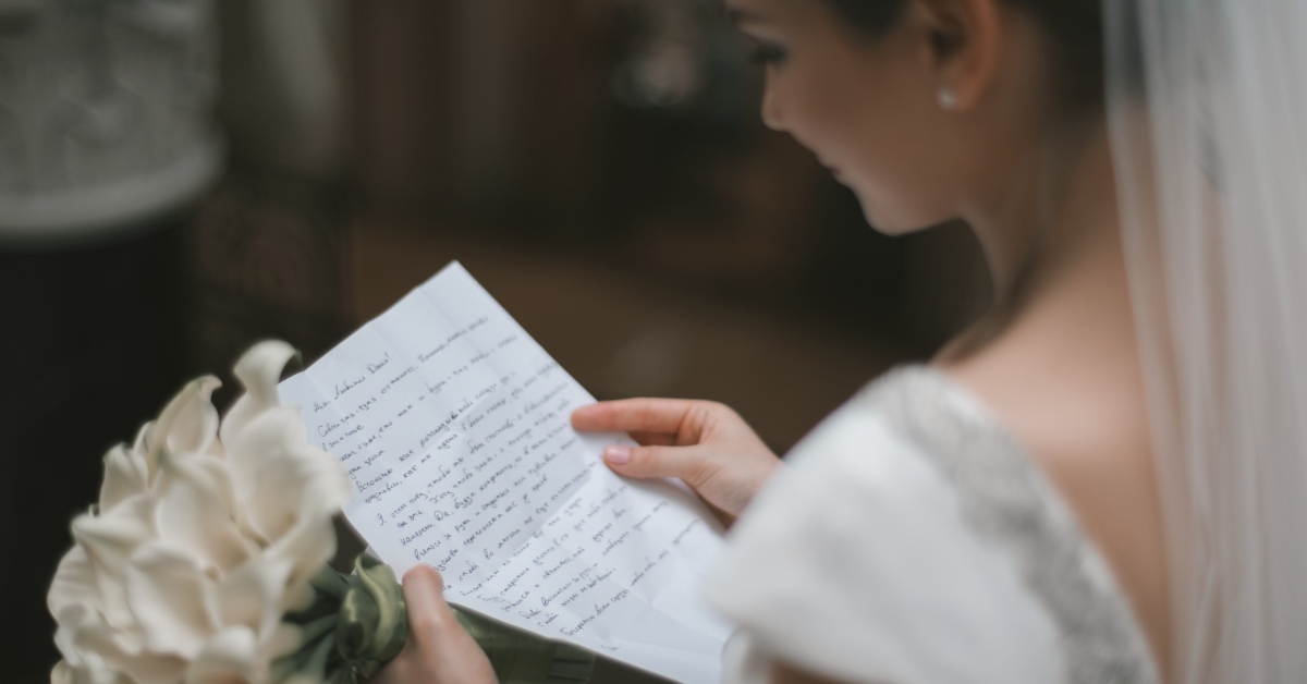 woman reading her wedding vow