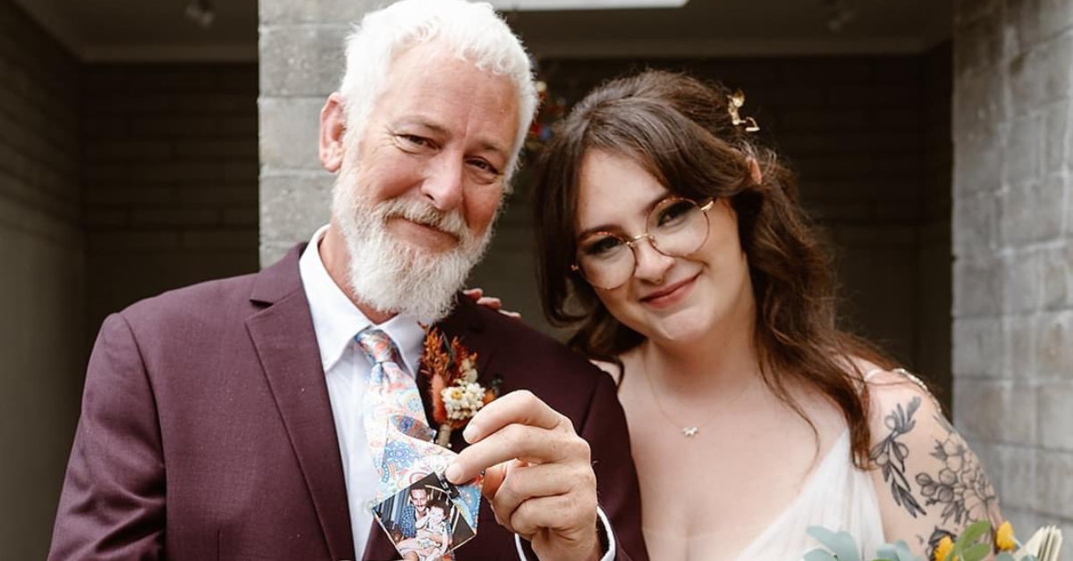 father showing of bride's wedding gift.