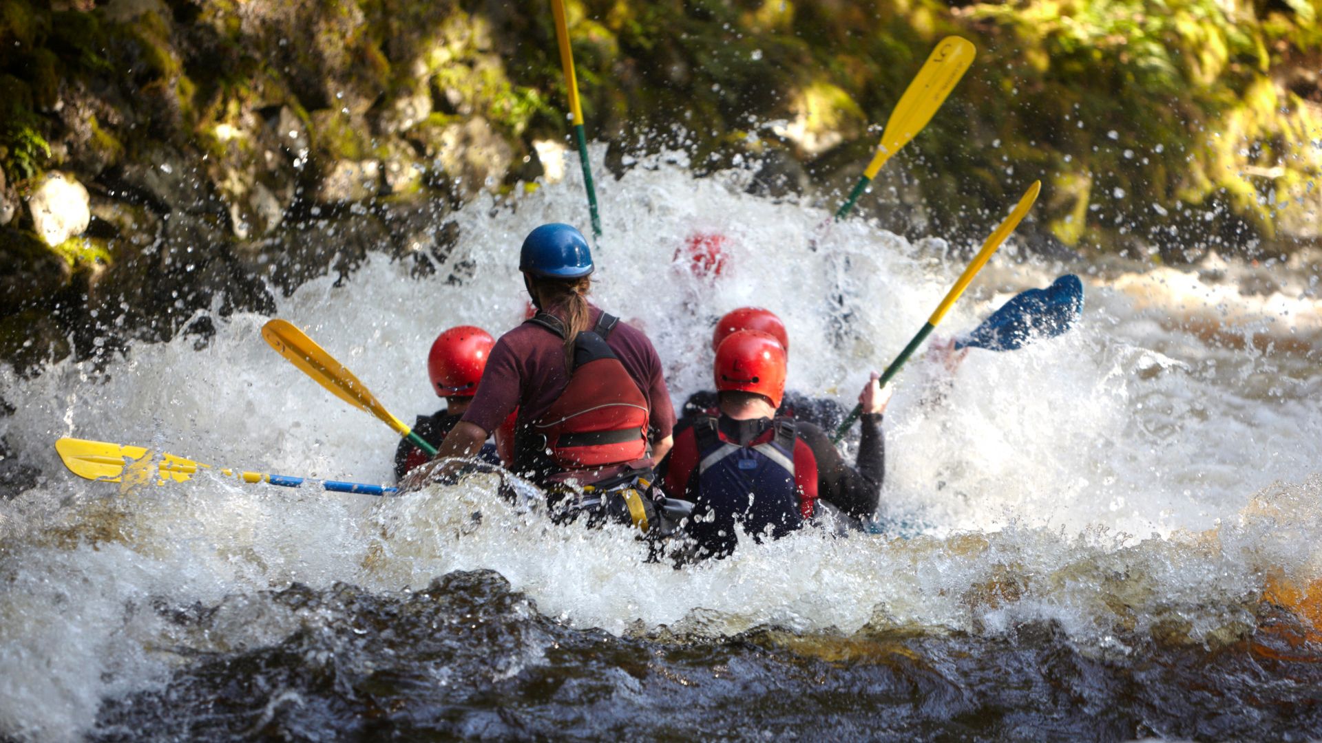 couple on white water rafting