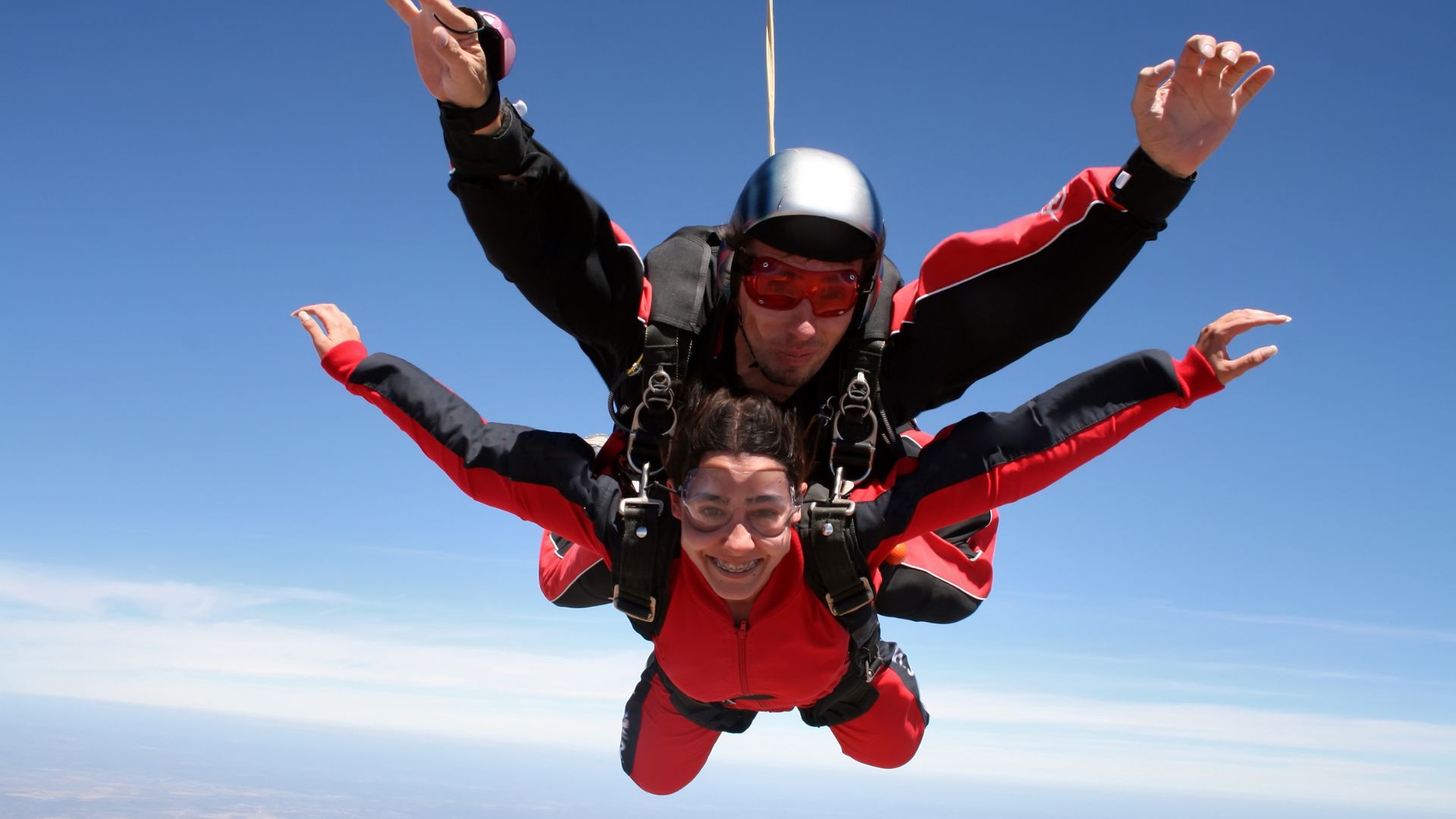 couple on sky diving