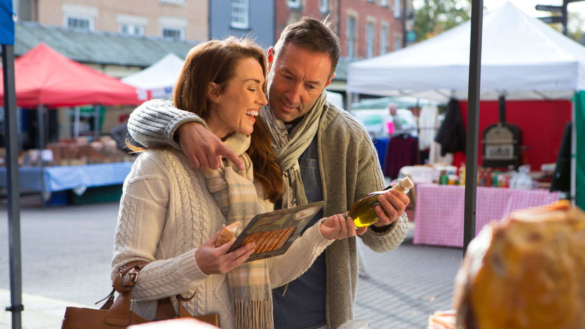 couple buying from a local market