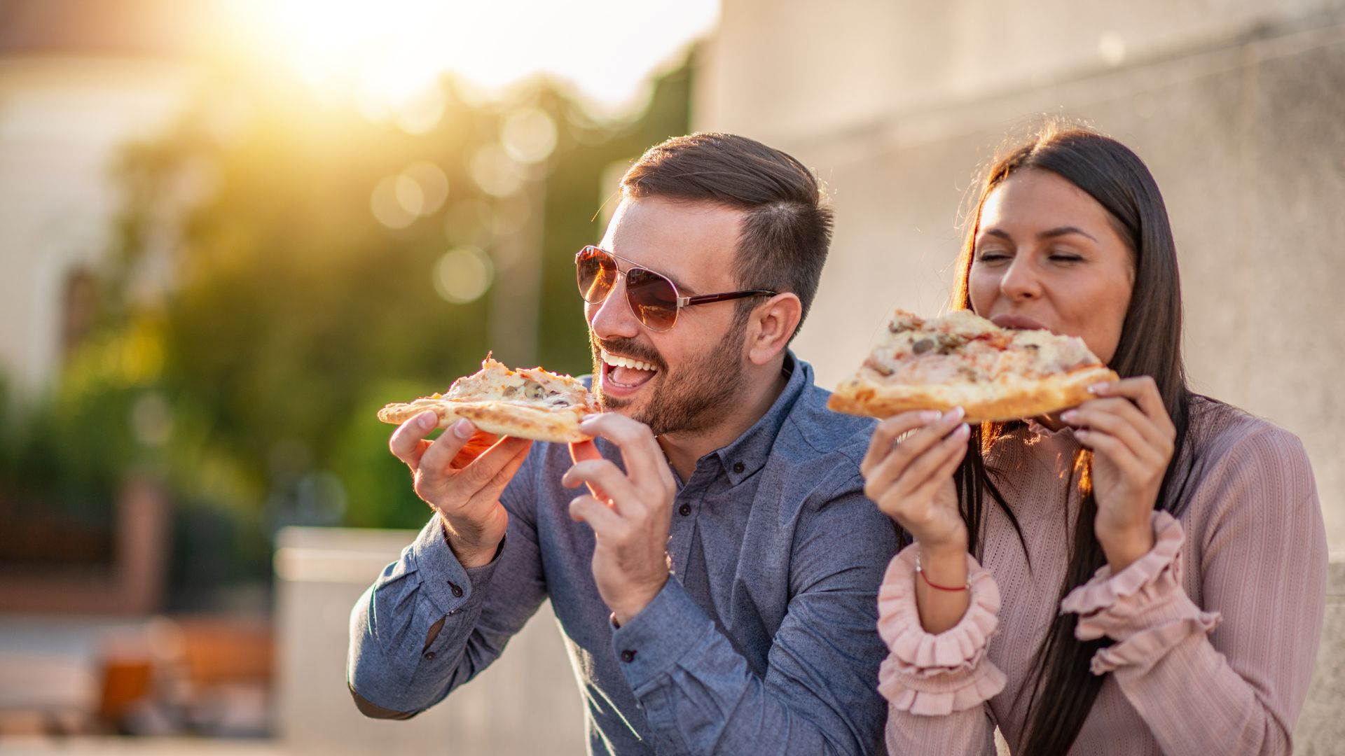 couple tasting local specialties